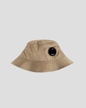 Load image into Gallery viewer, CP Company Chrome-R Lens Bucket Hat In Beige

