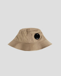 CP Company Chrome-R Lens Bucket Hat In Beige