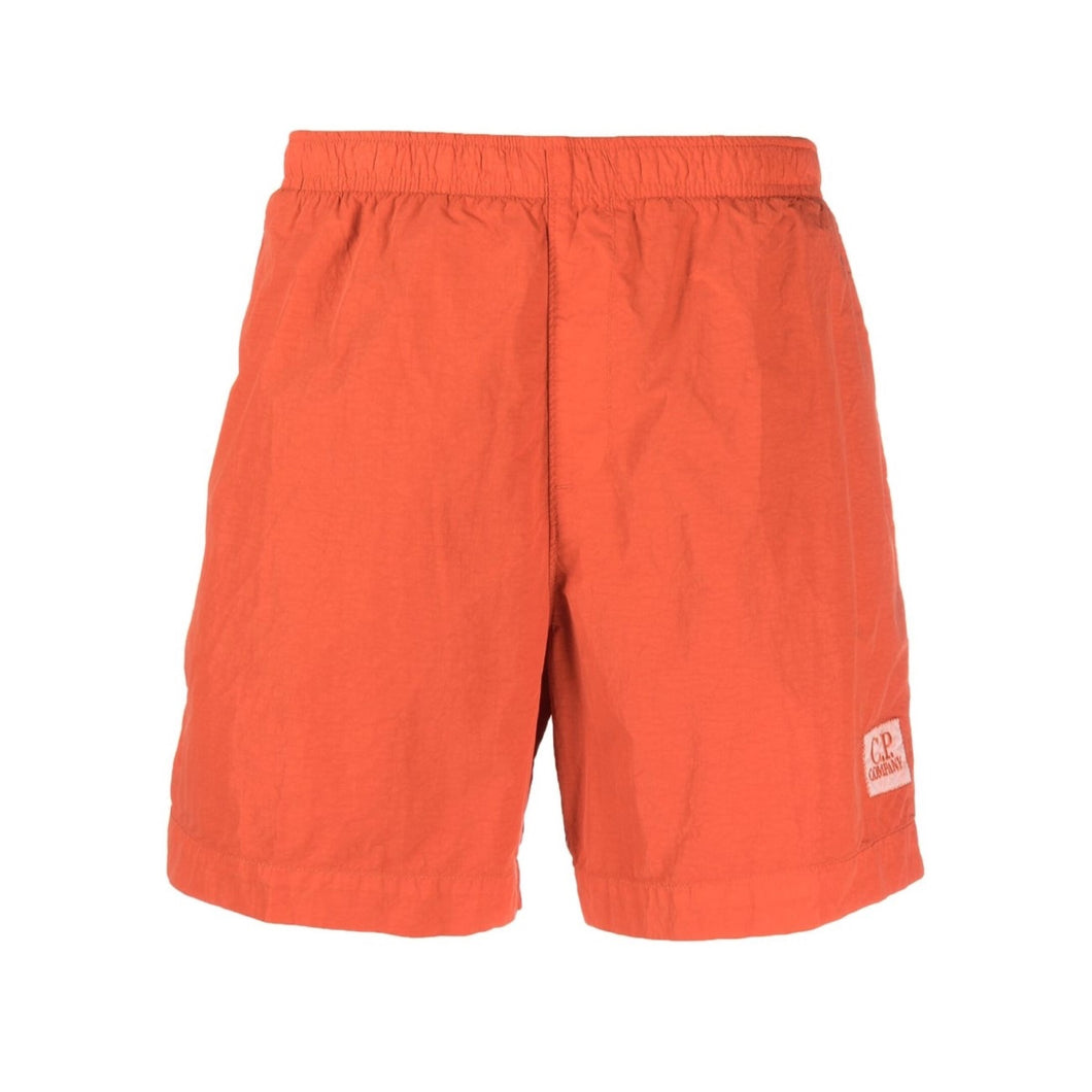 CP Company Flatt Nylon Stitch Logo Swim Shorts in Pumpkin Orange