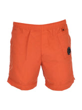 Load image into Gallery viewer, CP Company Flatt Nylon Lens Swim Shorts in Pumpkin Orange

