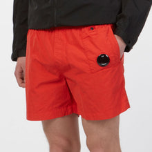 Load image into Gallery viewer, CP Company Flatt Nylon Lens Swim Shorts in Red
